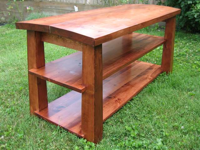 A big wooden bench with shelves