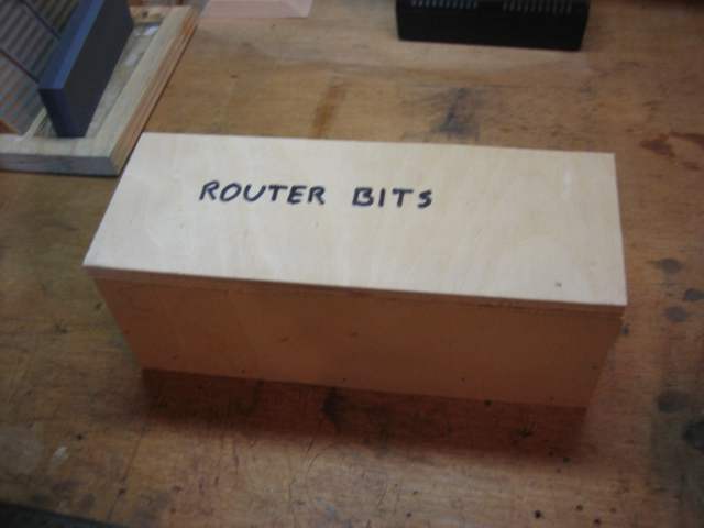 A hinged wooden box for storing routerbits or whatever