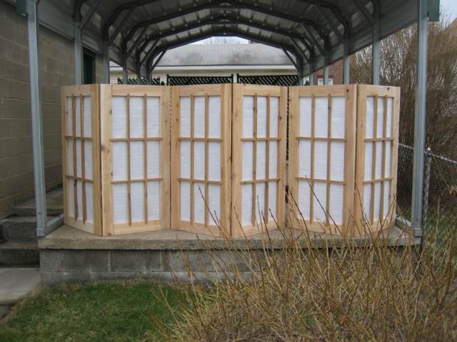 Screens on the carport after completion