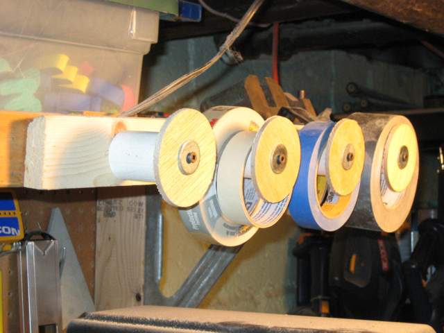 Rolls of tape on a tape roll rack